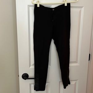 Black stretch jegging with leather zip bottoms